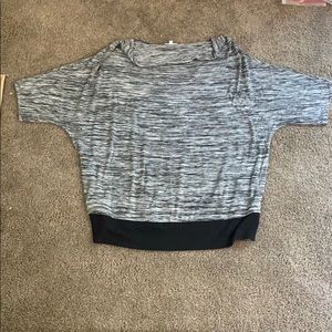 We have this black , white, and gray Blouse